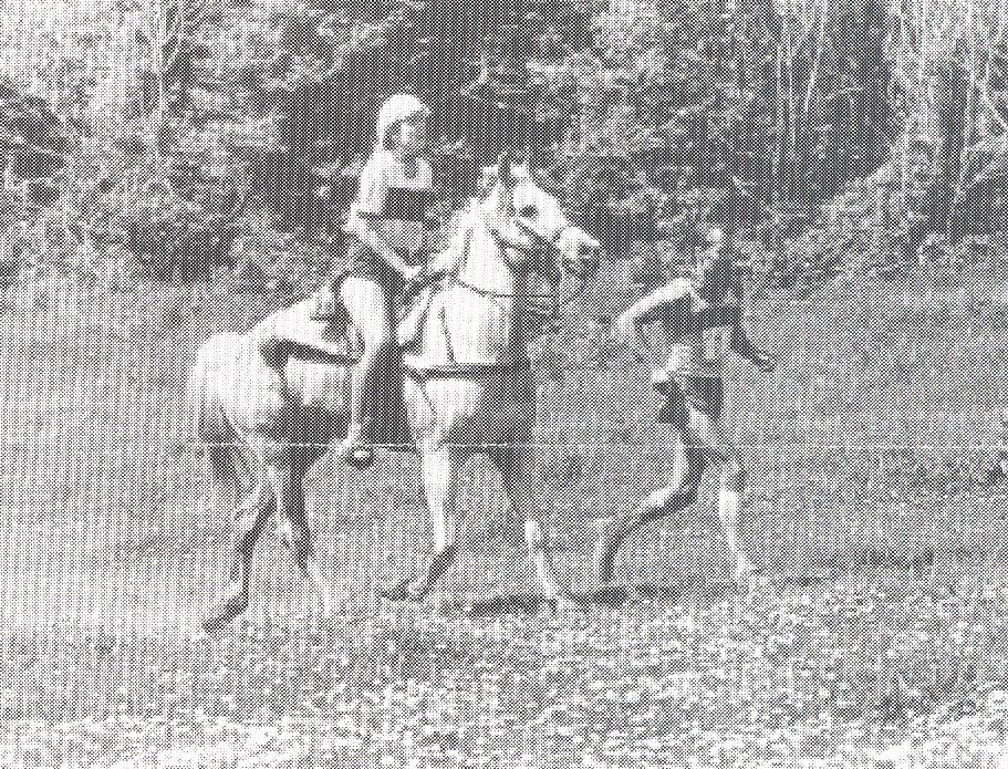 Old image of a horse and rider.